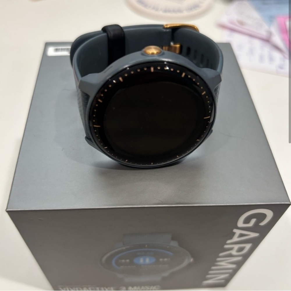 Garmin Black Smartwatch with Sleek Design and Circular Display